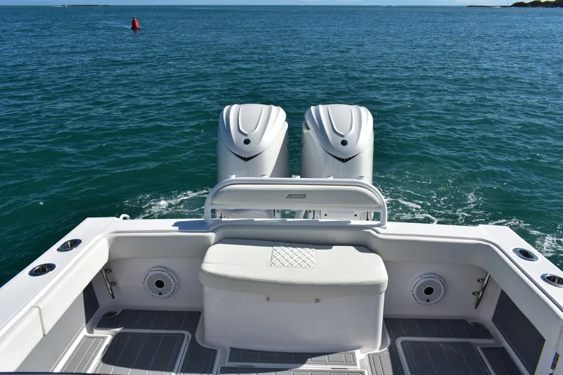 Full Circle Yacht Photos Pics 2025 Jupiter 32 FS boat with dual engines on open water.