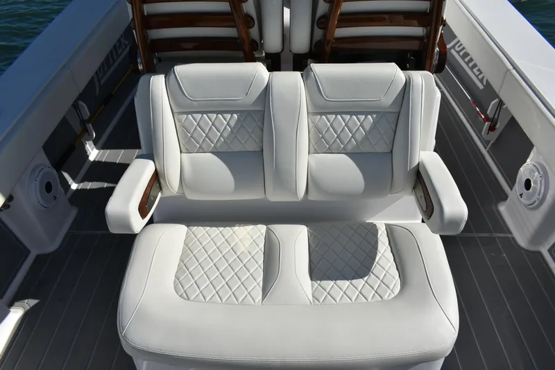 Full Circle Yacht Photos Pics Luxurious seating on 2025 Jupiter 32 FS boat with diamond-stitched upholstery.