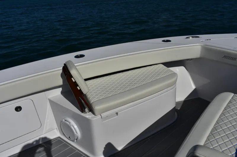 Full Circle Yacht Photos Pics Luxury seating on 2025 Jupiter 32 FS boat, featuring diamond-stitched upholstery.