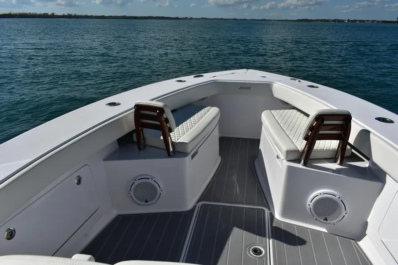 Full Circle Yacht Photos Pics 2025 Jupiter 32 FS boat interior with cushioned seating and ocean view.