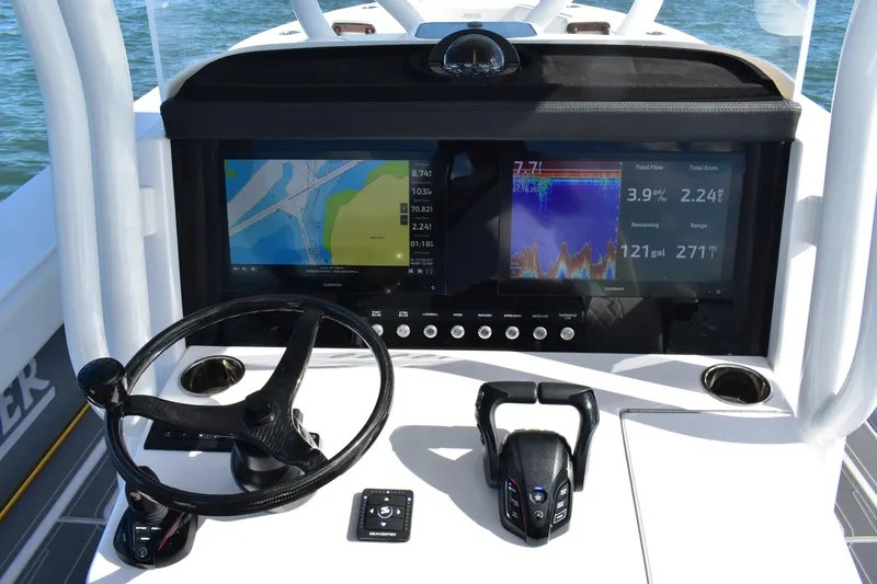 Full Circle Yacht Photos Pics Helm of 2025 Jupiter 32 FS boat with advanced navigation displays and controls.