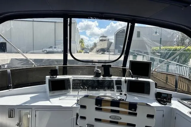 Traveller Yacht Photos Pics Cockpit view of a 1996 Jefferson 52 Rivanna Cockpit MY yacht, featuring navigation equipment.