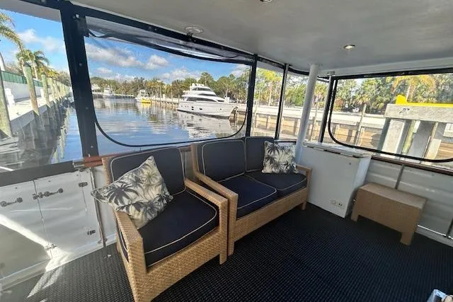 Traveller Yacht Photos Pics Interior of 1996 Jefferson 52 Rivanna Cockpit MY yacht with waterfront view.