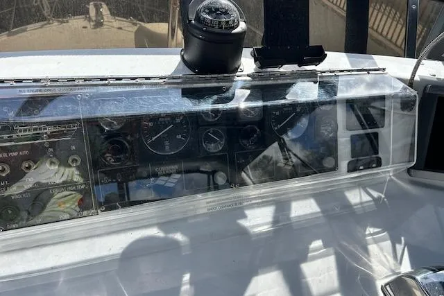 Traveller Yacht Photos Pics 1996 Jefferson 52 Rivanna Cockpit MY dashboard with compass and navigation instruments.