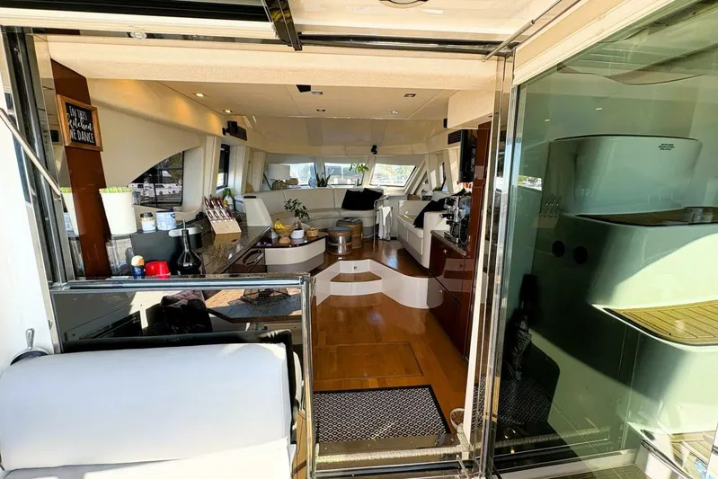  Yacht Photos Pics Luxurious interior of 2008 Sea Ray 47 Sedan Bridge yacht with modern amenities and elegant design.