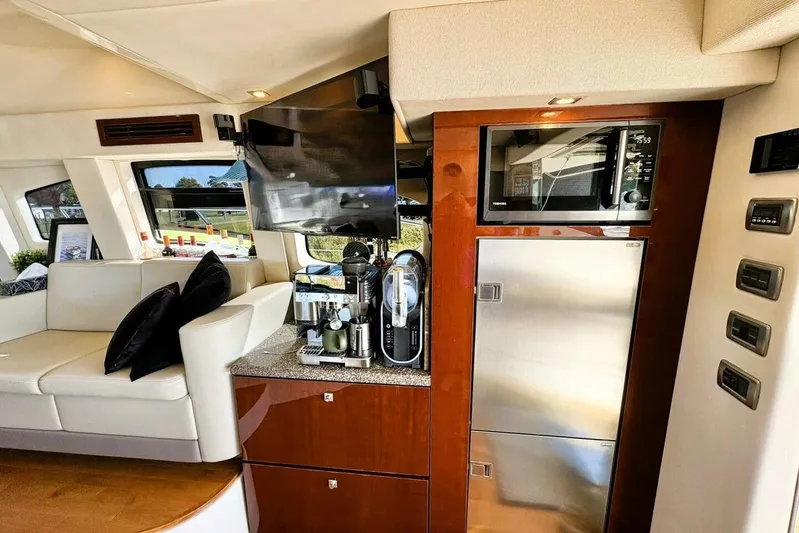  Yacht Photos Pics Luxurious interior of 2008 Sea Ray 47 Sedan Bridge yacht with modern amenities.