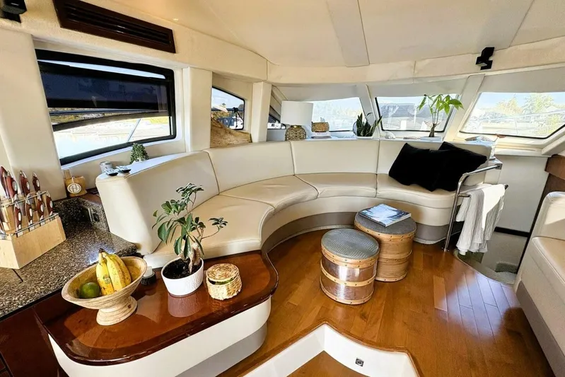  Yacht Photos Pics Luxurious interior of 2008 Sea Ray 47 Sedan Bridge yacht with elegant seating and decor.