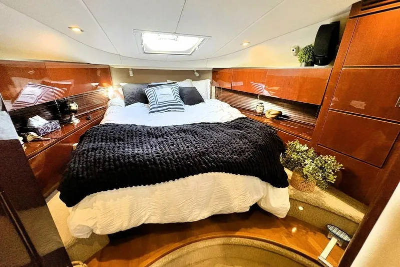  Yacht Photos Pics Luxurious bedroom interior of 2008 Sea Ray 47 Sedan Bridge yacht.
