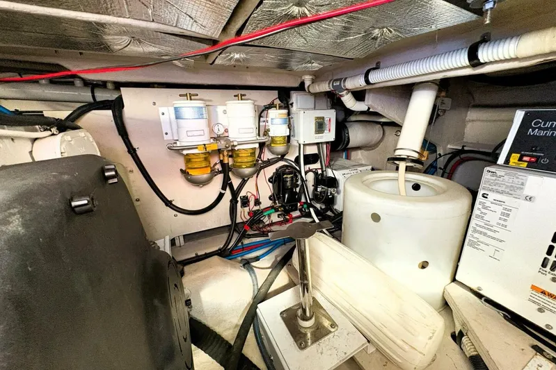  Yacht Photos Pics Engine room of 2008 Sea Ray 47 Sedan Bridge with mechanical components and wiring.