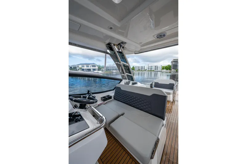  Yacht Photos Pics Interior view of 2023 Aquila 32 Power Cat, featuring sleek seating and modern design.