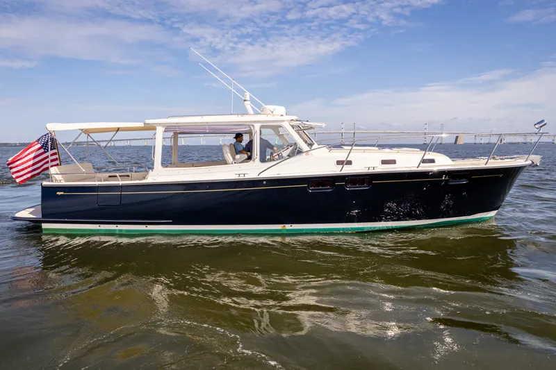 Ephemera Yacht Photos Pics 2009 MJM 40z yacht cruising on open water under a clear sky.