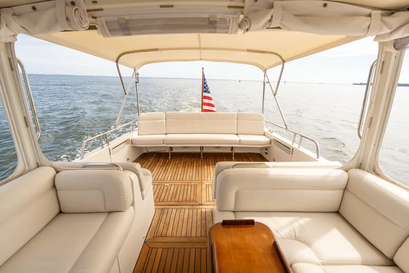 Ephemera Yacht Photos Pics Luxurious 2009 MJM 40z yacht interior with elegant seating and ocean view.