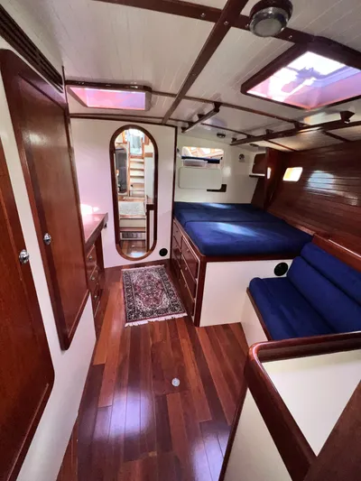 Malabar Yacht Photos Pics Luxurious 2014 Custom 53' Expedition yacht interior with wood finish and cozy seating.