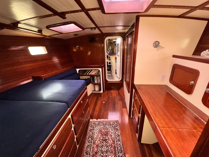 Malabar Yacht Photos Pics Luxurious wooden interior of 2014 Custom 53' Expedition Voyaging Lifting Keeler yacht cabin.