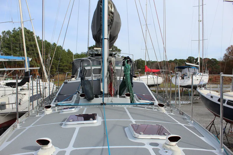 Malabar Yacht Photos Pics Custom 53' Expedition Voyaging Lifting Keeler sailboat, 2014 model, docked among other boats.