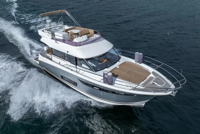  Yacht Photos Pics 2016 Jeanneau Velasco 43F yacht cruising on open water.