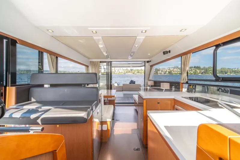 Yacht Photos Pics Interior of 2016 Jeanneau Velasco 43F yacht with modern design and panoramic windows.