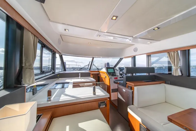  Yacht Photos Pics Interior of 2016 Jeanneau Velasco 43F yacht with modern design and panoramic windows.