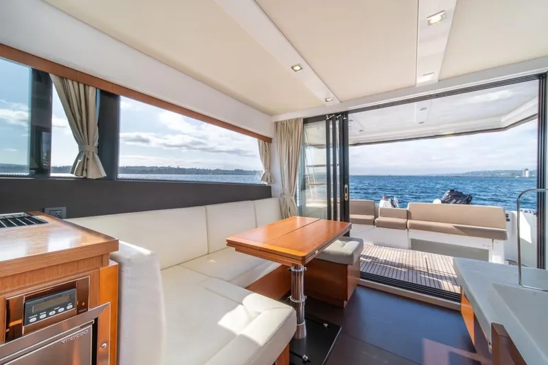  Yacht Photos Pics Interior of 2016 Jeanneau Velasco 43F yacht with ocean view and elegant seating area.