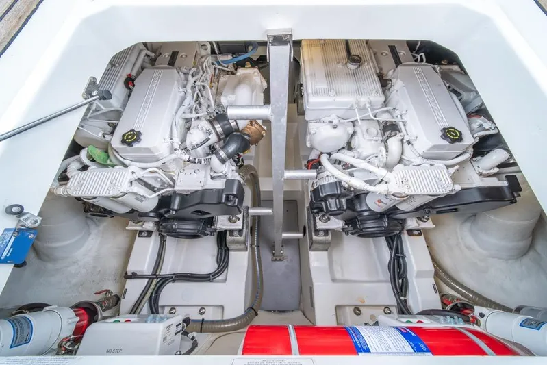  Yacht Photos Pics Engine compartment of 2016 Jeanneau Velasco 43F, showcasing dual engines and mechanical components.