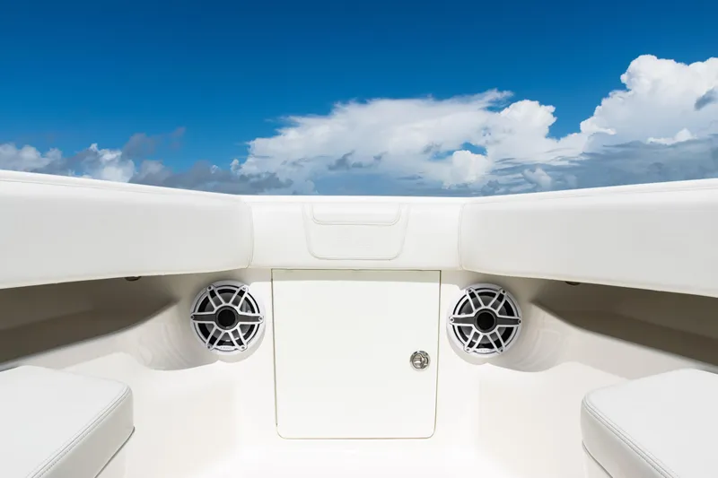  Yacht Photos Pics 2023 SeaVee 340Z boat interior with speakers, under a clear blue sky.