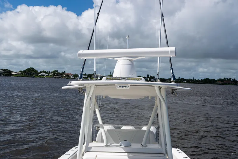  Yacht Photos Pics 2023 SeaVee 340Z boat on water, featuring radar and antennas under cloudy sky.