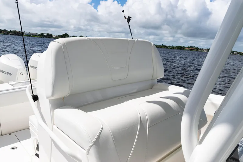  Yacht Photos Pics 2023 SeaVee 340Z boat with white seating, Mercury engines, and scenic water view.
