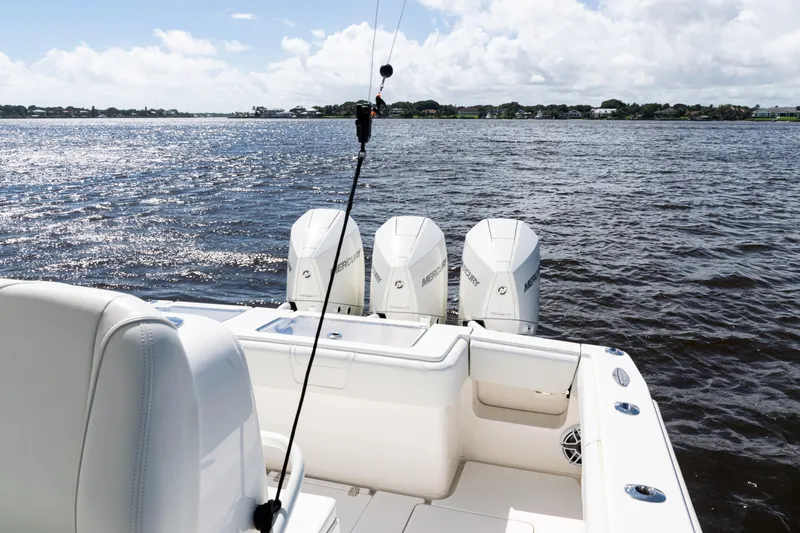  Yacht Photos Pics 2023 SeaVee 340Z boat with triple Mercury engines on a sunny day.