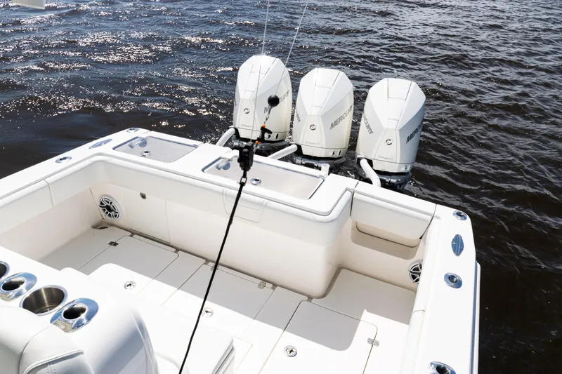  Yacht Photos Pics 2023 SeaVee 340Z boat with triple Mercury outboard engines on open water.