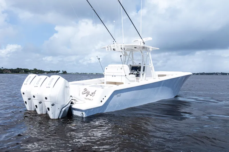  Yacht Photos Pics 2023 SeaVee 340Z boat with triple outboard engines on open water.