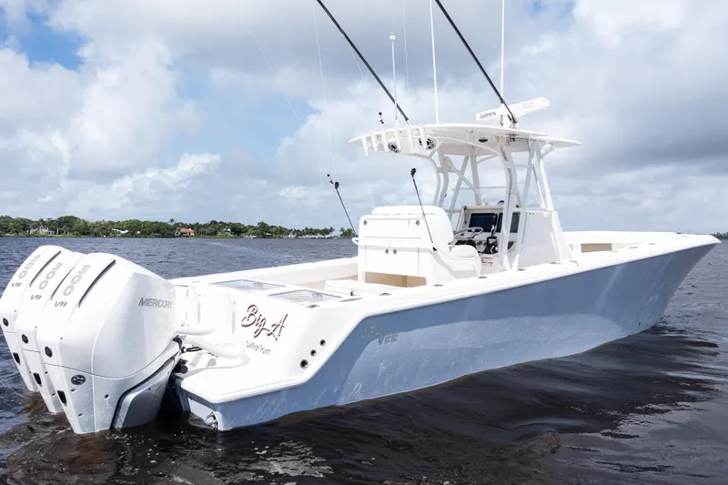  Yacht Photos Pics 2023 SeaVee 340Z boat with triple Mercury engines on calm water.