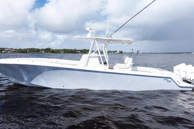  Yacht Photos Pics 2023 SeaVee 340Z boat on water, featuring sleek design and modern fishing equipment.