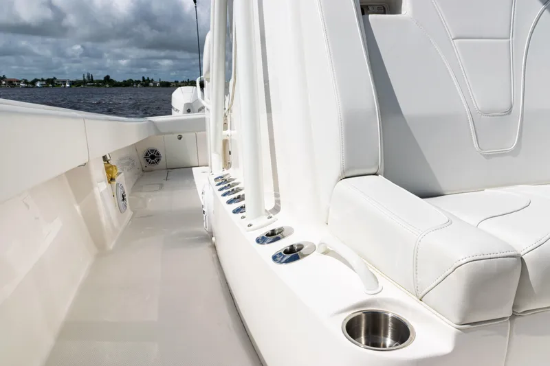  Yacht Photos Pics 2023 SeaVee 340Z boat interior with white seating and cup holders.