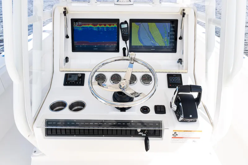  Yacht Photos Pics 2023 SeaVee 340Z boat dashboard with dual screens and steering wheel.