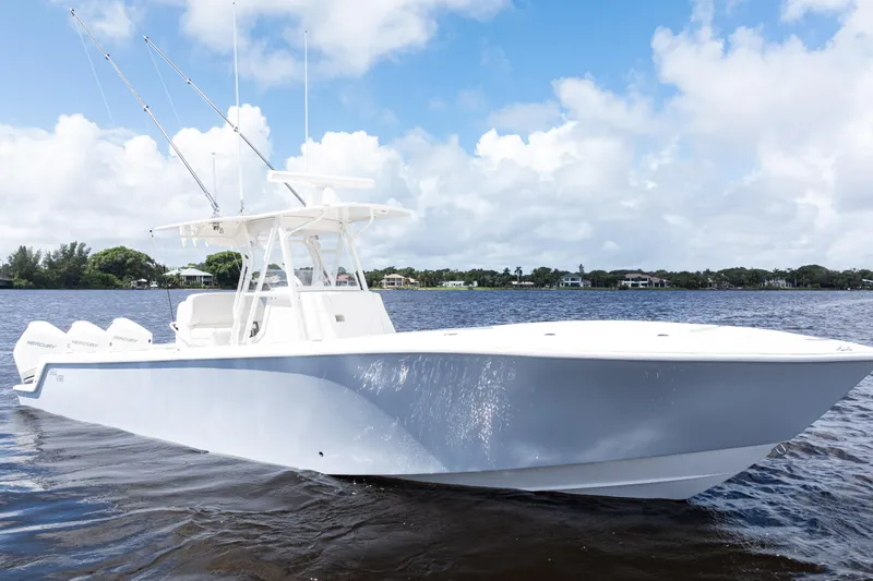 Yacht Photos Pics 2023 SeaVee 340Z boat on calm water under a partly cloudy sky.