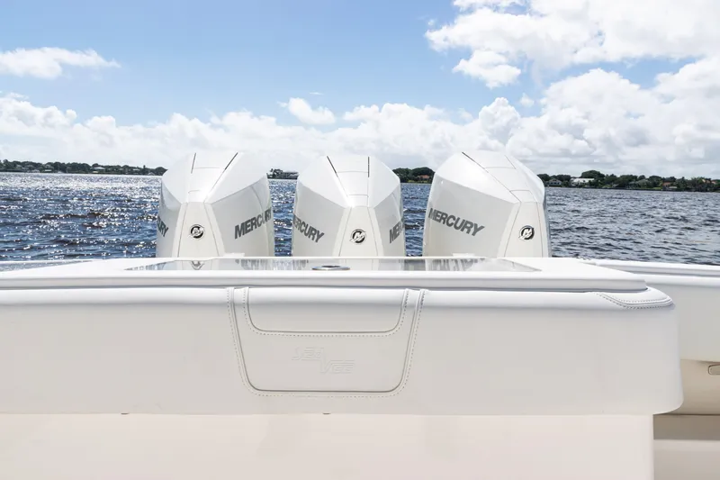  Yacht Photos Pics 2023 SeaVee 340Z boat with triple Mercury engines on a sunny day.
