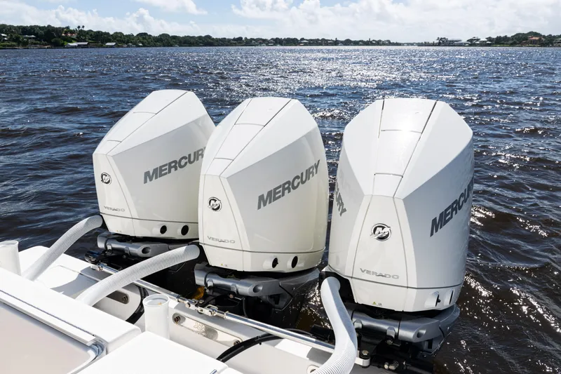 Yacht Photos Pics Triple Mercury Verado engines on a 2023 SeaVee 340Z boat, cruising on open water.