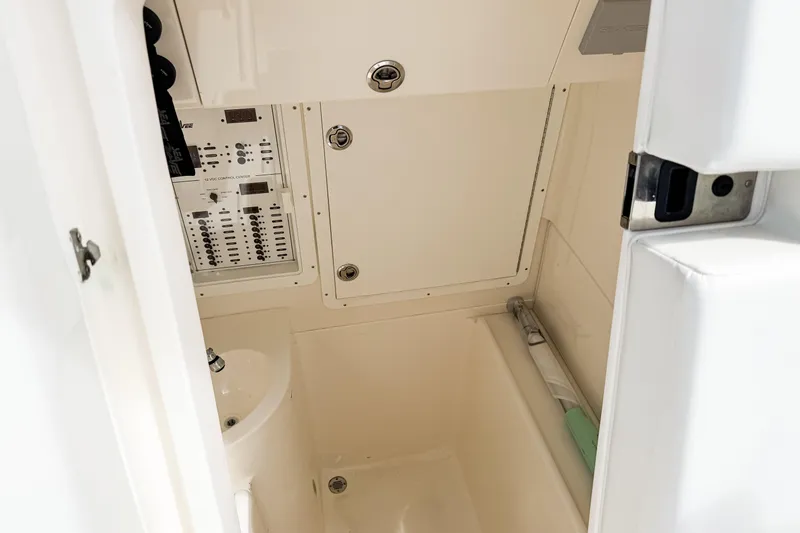  Yacht Photos Pics 2023 SeaVee 340Z interior with control panel and compact sink.