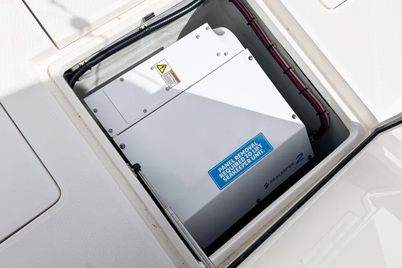  Yacht Photos Pics 2023 SeaVee 340Z boat featuring Seakeeper 2 stabilization unit in open compartment.