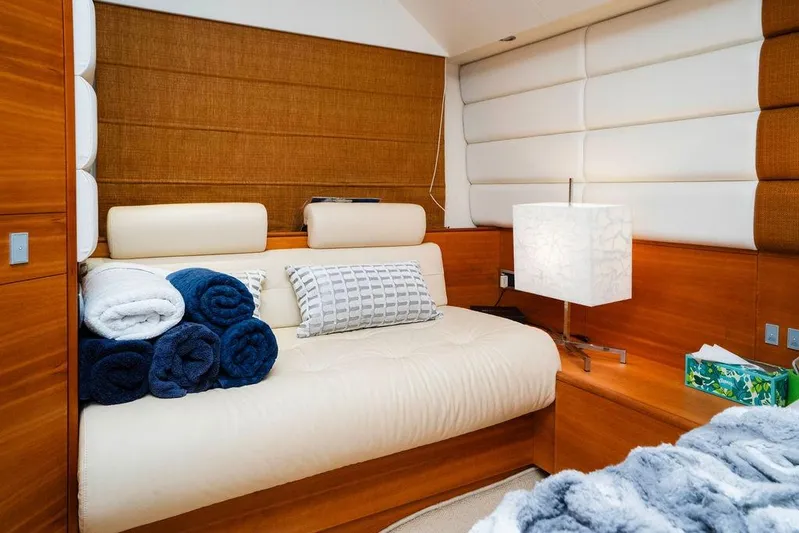 Voluptas Yacht Photos Pics Luxurious interior of 2006 Aicon 64 yacht with cozy seating and elegant decor.