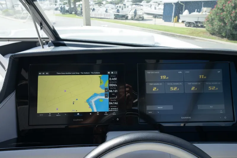  Yacht Photos Pics 2024 Cobalt 30SC Outboard dashboard with dual Garmin navigation screens.