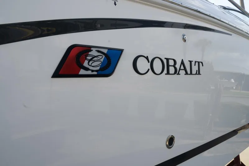  Yacht Photos Pics 2024 Cobalt 30SC Outboard boat logo and branding on hull.