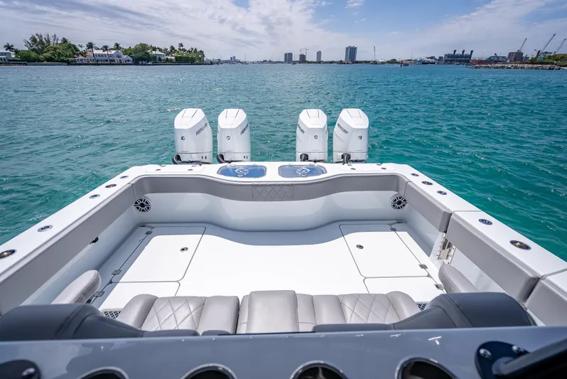  Yacht Photos Pics 2024 Freeman 43 boat with quad engines on a sunny day at sea.