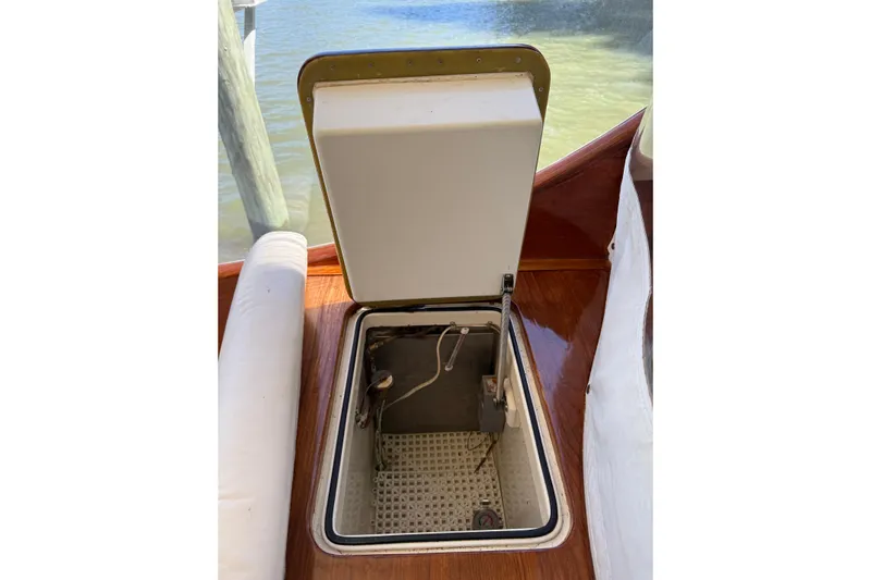 Brass Ring Yacht Photos Pics Open hatch on 2003 Hinckley Talaria 40 boat, revealing storage compartment.