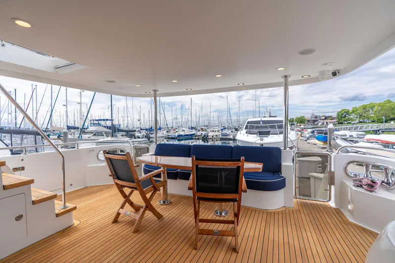 Whitefish Yacht Photos Pics Luxurious 2013 Ocean Alexander 72 Pilothouse yacht with elegant deck seating at marina.