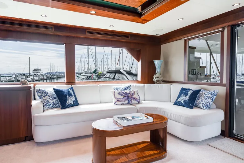 Whitefish Yacht Photos Pics Luxurious interior of 2013 Ocean Alexander 72 Pilothouse yacht with elegant white seating.