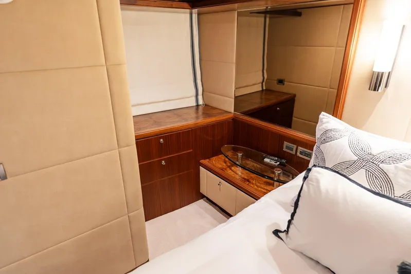 Whitefish Yacht Photos Pics Luxurious cabin interior of 2013 Ocean Alexander 72 Pilothouse yacht with elegant wood finish.