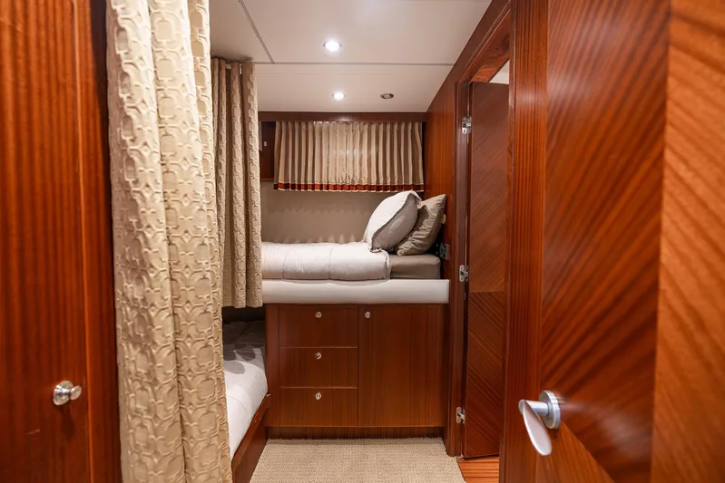Whitefish Yacht Photos Pics Luxurious cabin interior of 2013 Ocean Alexander 72 Pilothouse yacht with wood finish.