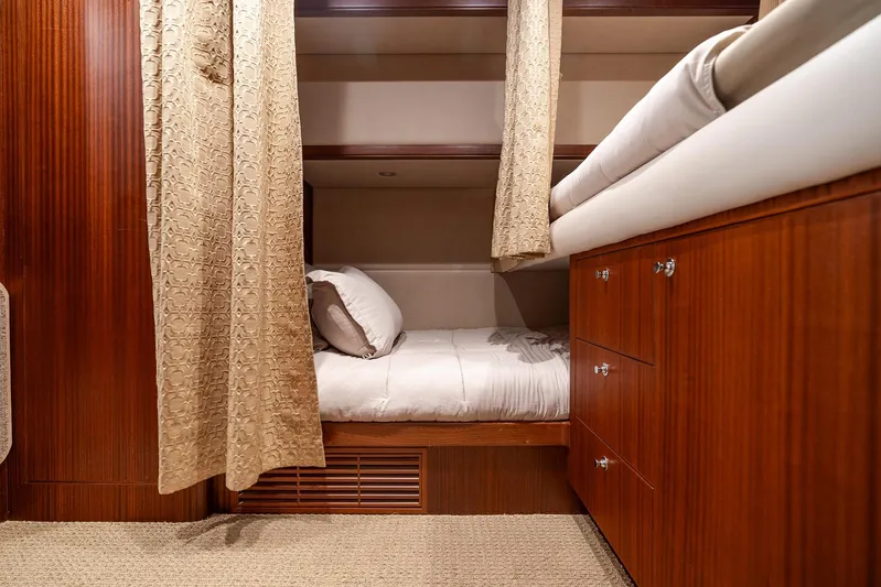 Whitefish Yacht Photos Pics Luxurious cabin interior of 2013 Ocean Alexander 72 Pilothouse yacht with wooden finishes.