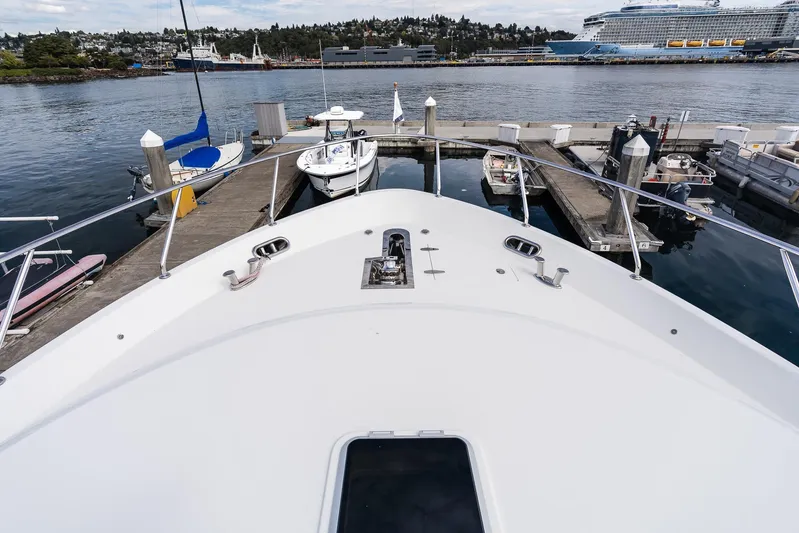 Whitefish Yacht Photos Pics Bow view of 2013 Ocean Alexander 72 Pilothouse docked at marina.